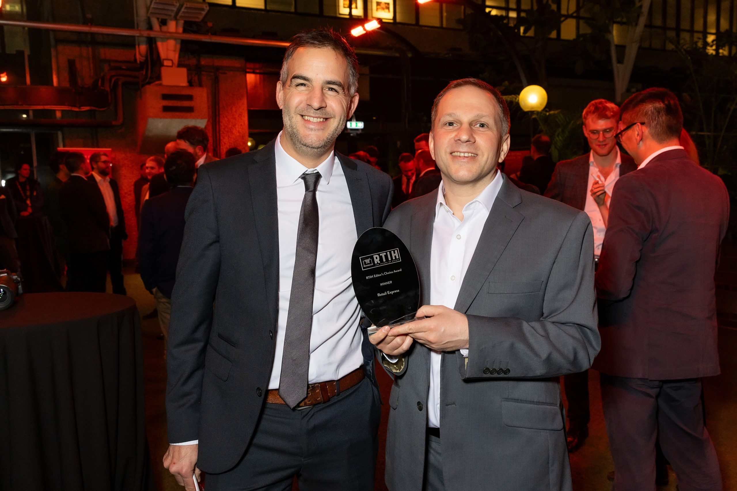 Ed Betts and Mark Grange holding the award